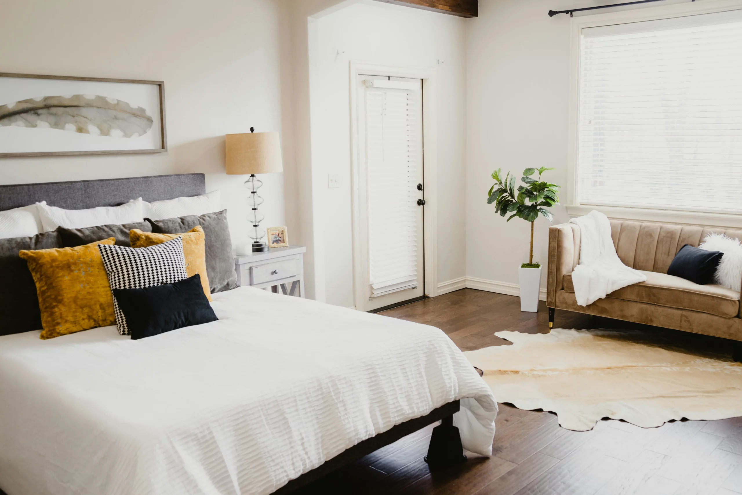 Image of a clean and neatly made bedroom after a professional house cleaning visit