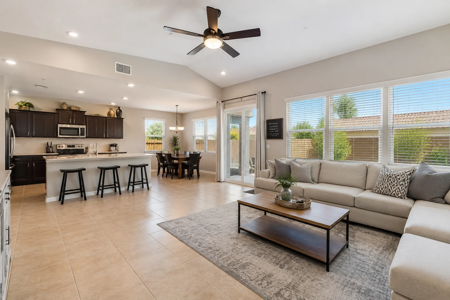 Image of a spotless Mesa AZ open plan living room with tile floors after professional cleaning