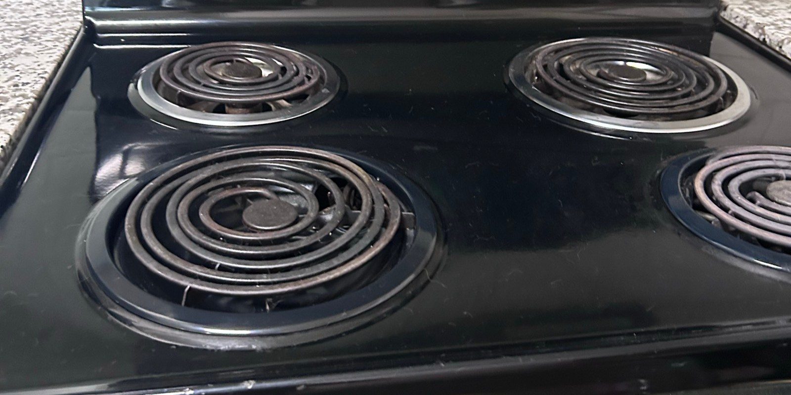 Electric stovetop clean and shiny after a cleaning in Avondale, AZ