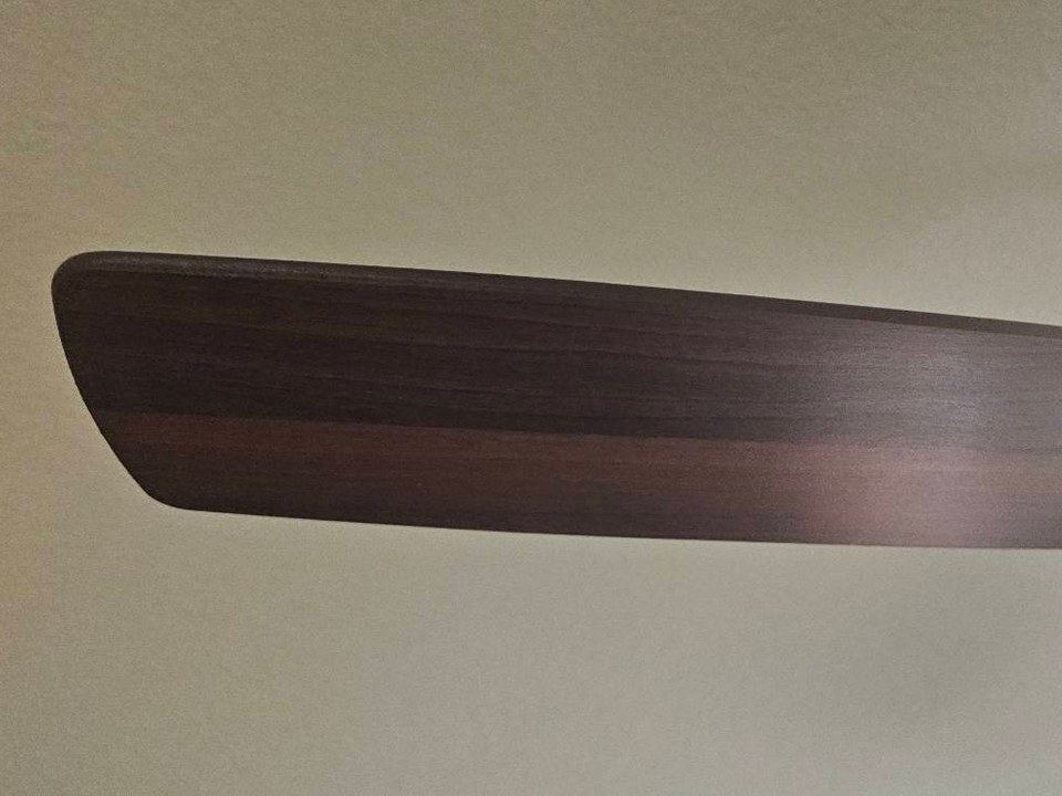 Same ceiling fan blade wiped clean after cleaning in Yuma, AZ