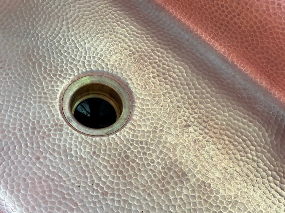 Same hammered copper sink polished bright after a cleaning in Chino Valley, AZ