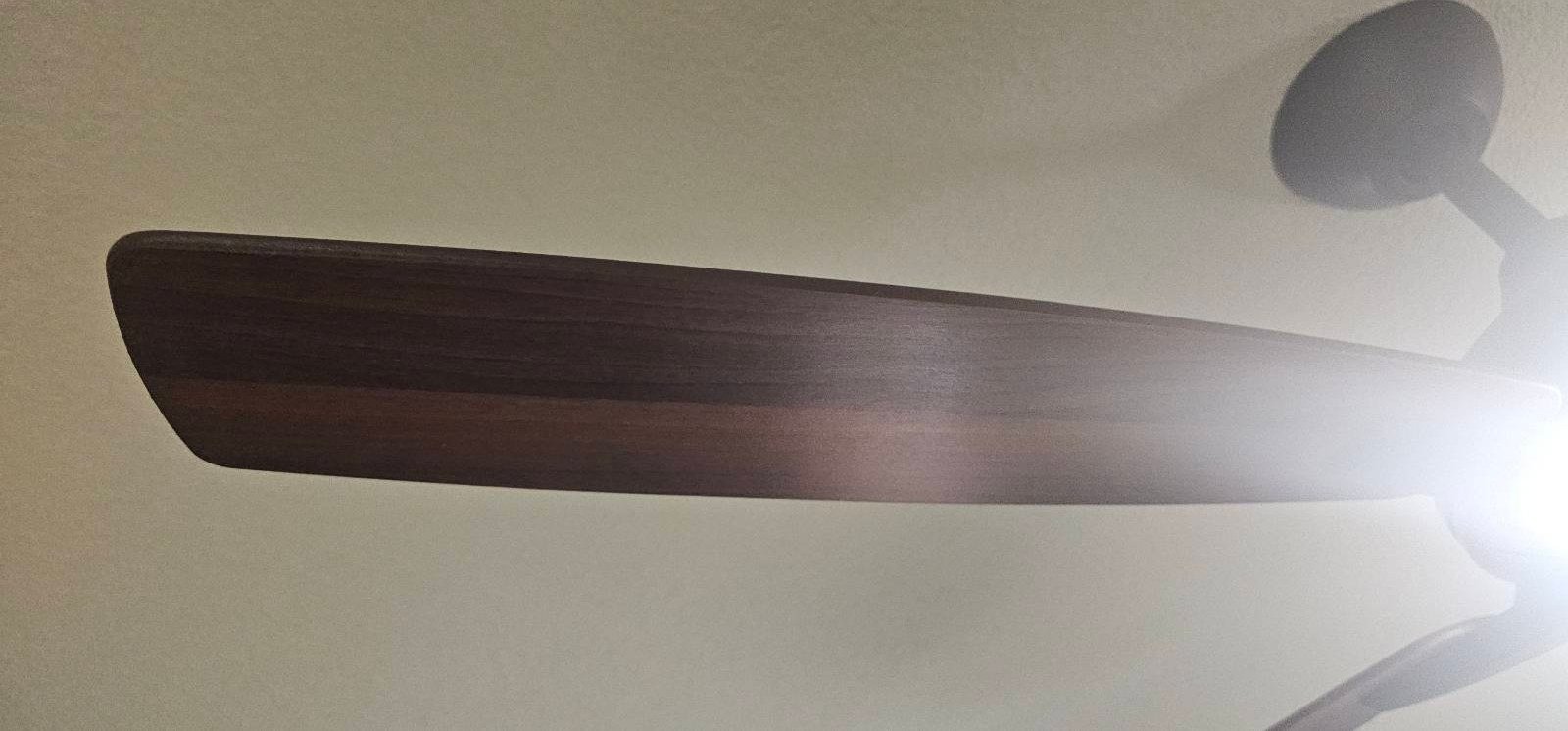 Ceiling fan blade wiped clean after a cleaning in Yuma, AZ