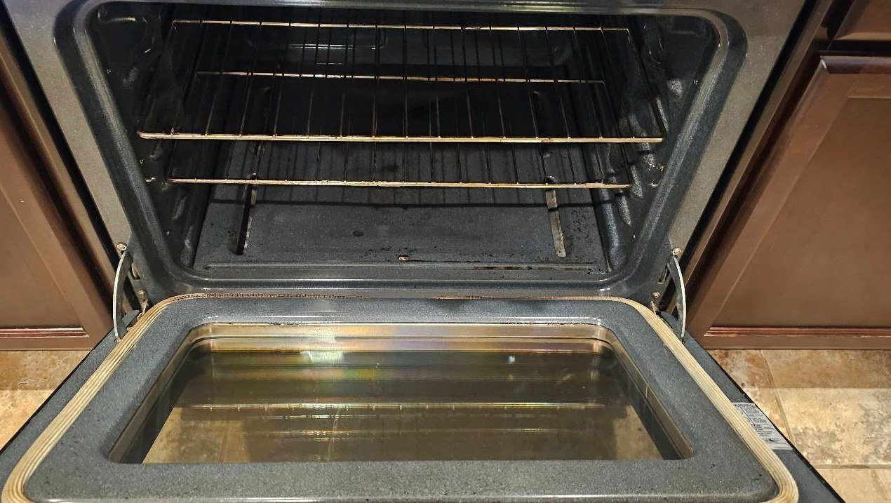 Oven with clear door glass and a clean floor after a cleaning in Yuma, AZ