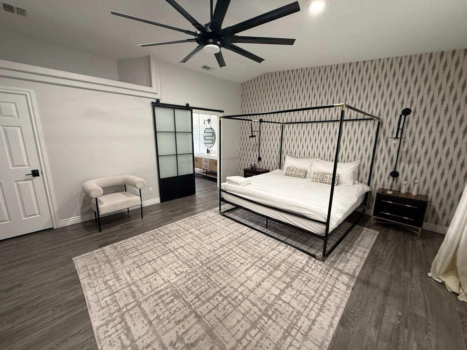 Clean bedroom with a made canopy bed after a cleaning in Lake Havasu City, AZ