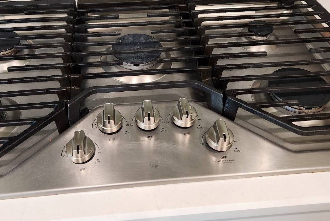 Same stainless gas stovetop clean and shining after a cleaning in Marana, AZ