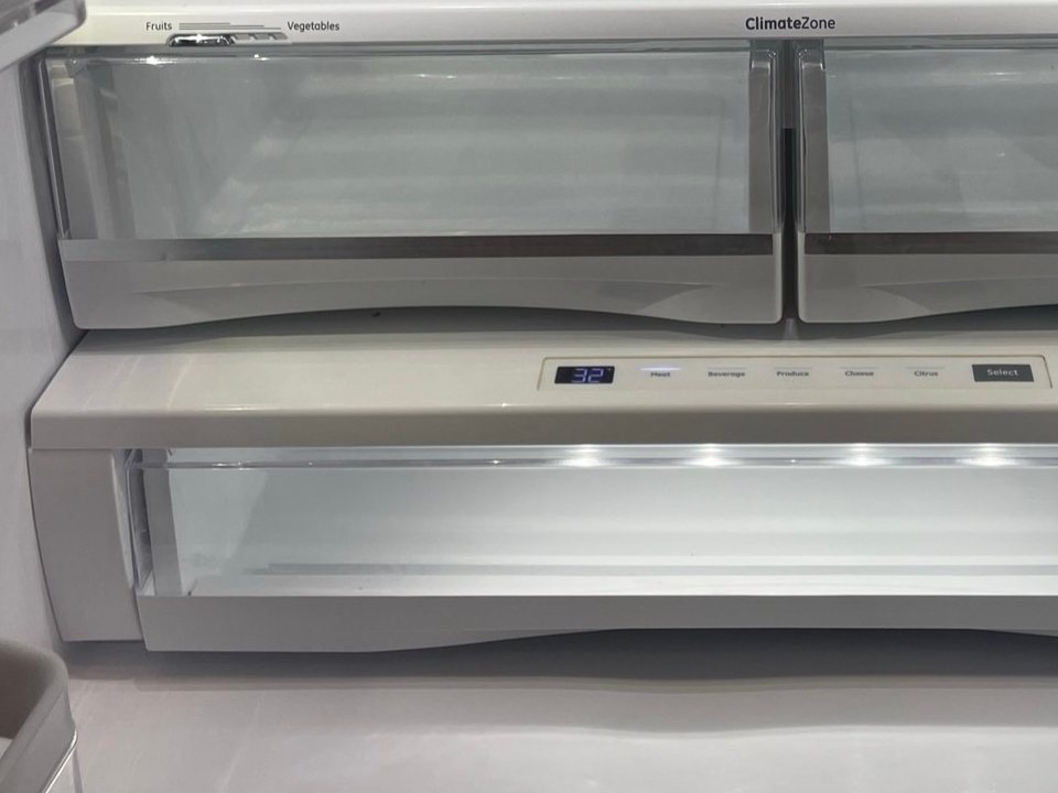 Same refrigerator drawers and floor clean and clear after a cleaning in Phoenix, AZ