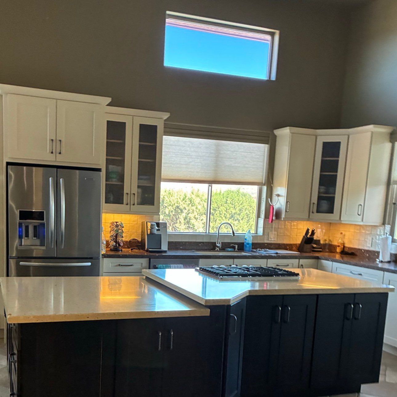 Clean kitchen island, counters and stainless fridge after a cleaning in Sedona, AZ