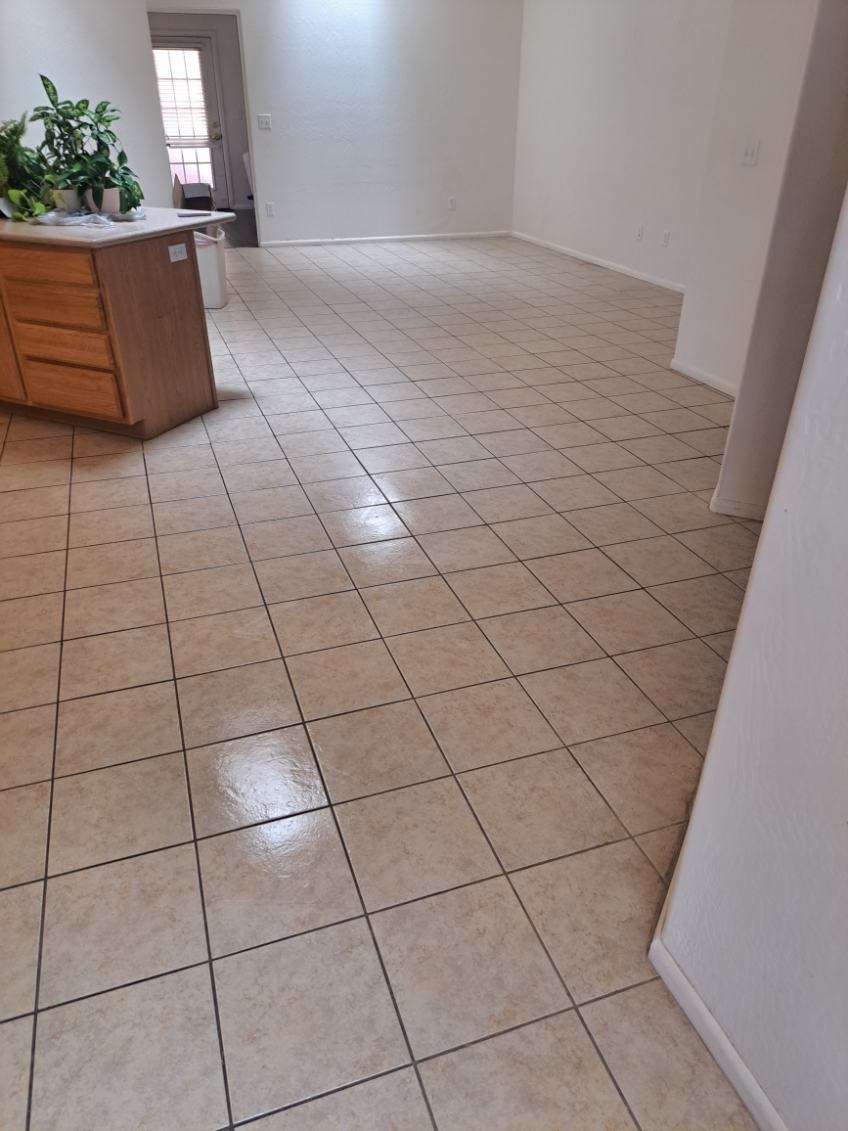 Empty living area with shiny tile floors after a move-out cleaning in Sedona, AZ