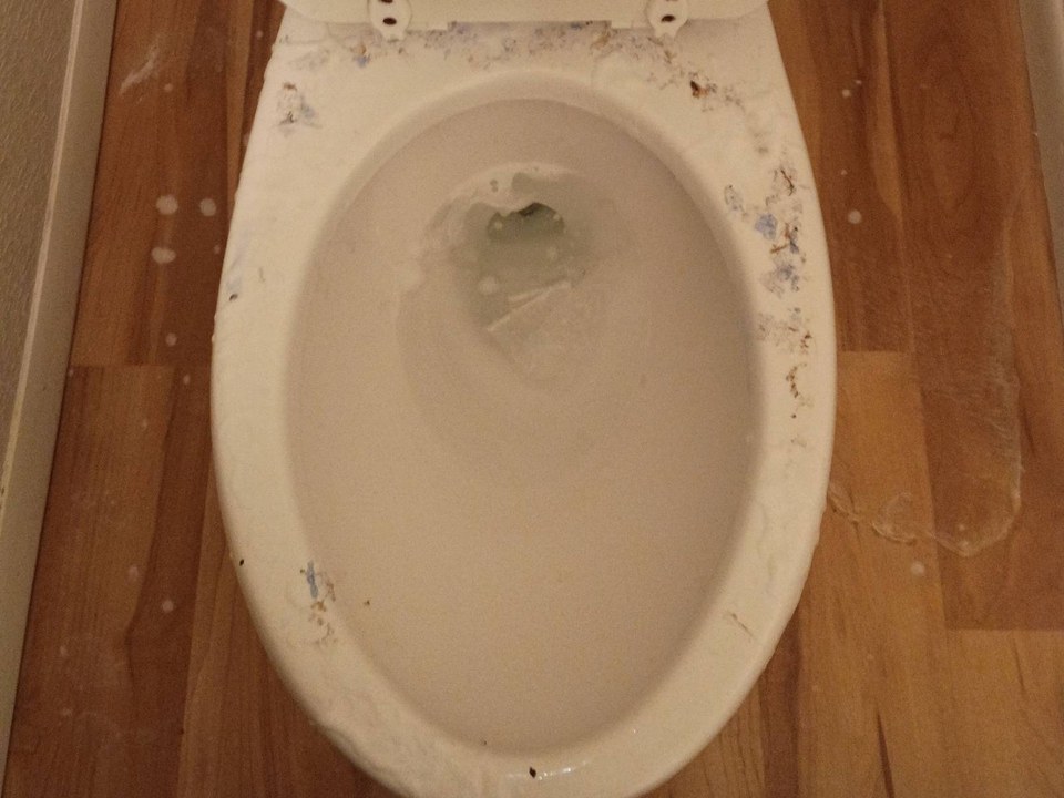 Toilet bowl rim with grime and stains before a cleaning in Sedona, AZ